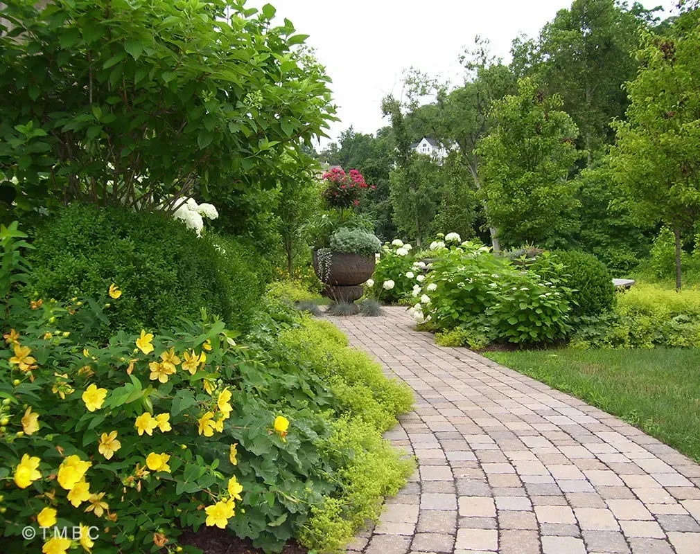 Nouveau Mediterranean landscape design with stonework, pottery, and courtyard planting image 7