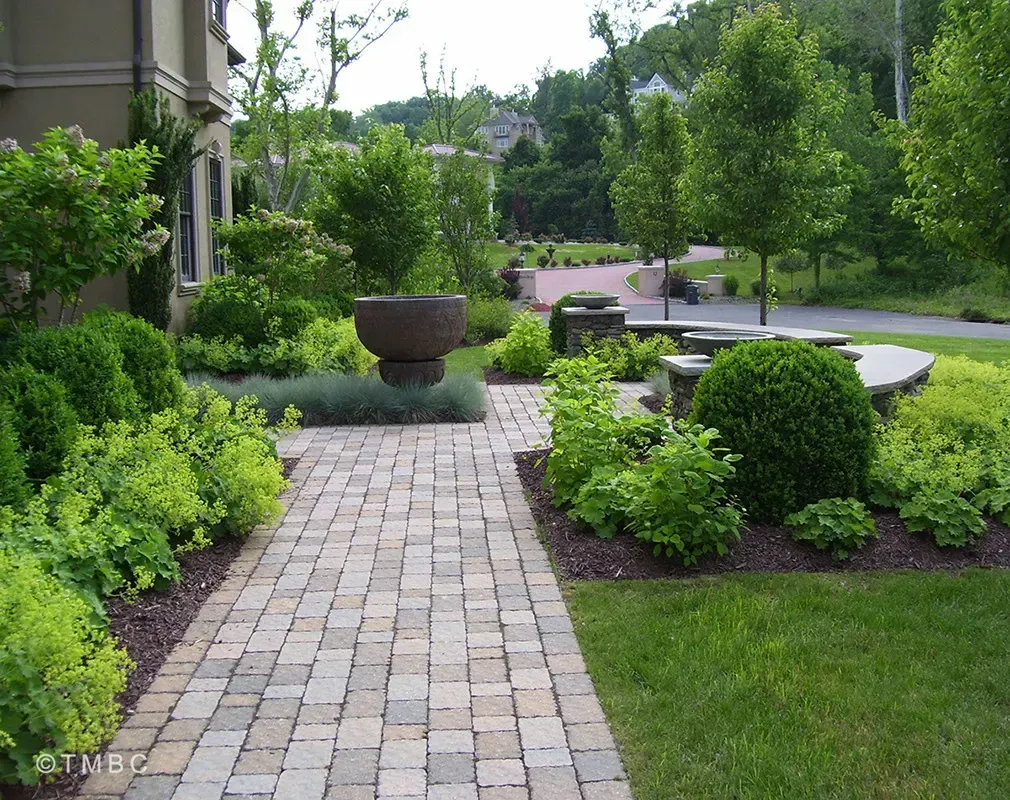 Nouveau Mediterranean landscape design with stonework, pottery, and courtyard planting image 9