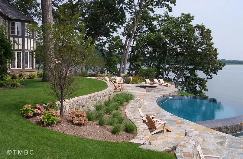 Custom pool design, spa, water feature, and outdoor living environment image 8